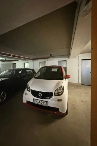 Zugehöriger Tiefgaragenstellplatz