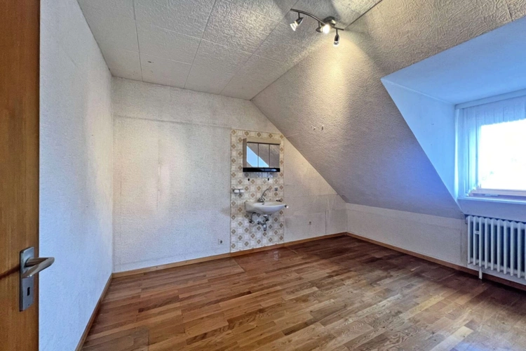 Schlafzimmer mit Waschbecken