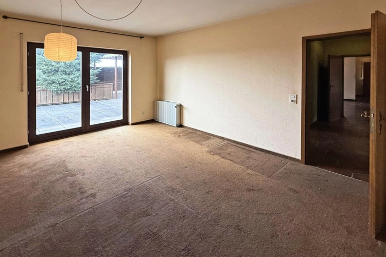 Schlafzimmer mit Balkonzugang