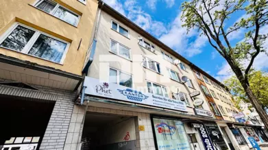 Modernisiertes Mehrfamilienhaus mit 8 Wohneinheiten und 2 Gewerbeflächen