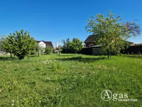 Bauträgerfreies Grundstück mit einer ca. 70 m² großen Lagerhalle und Obstbaumwie...